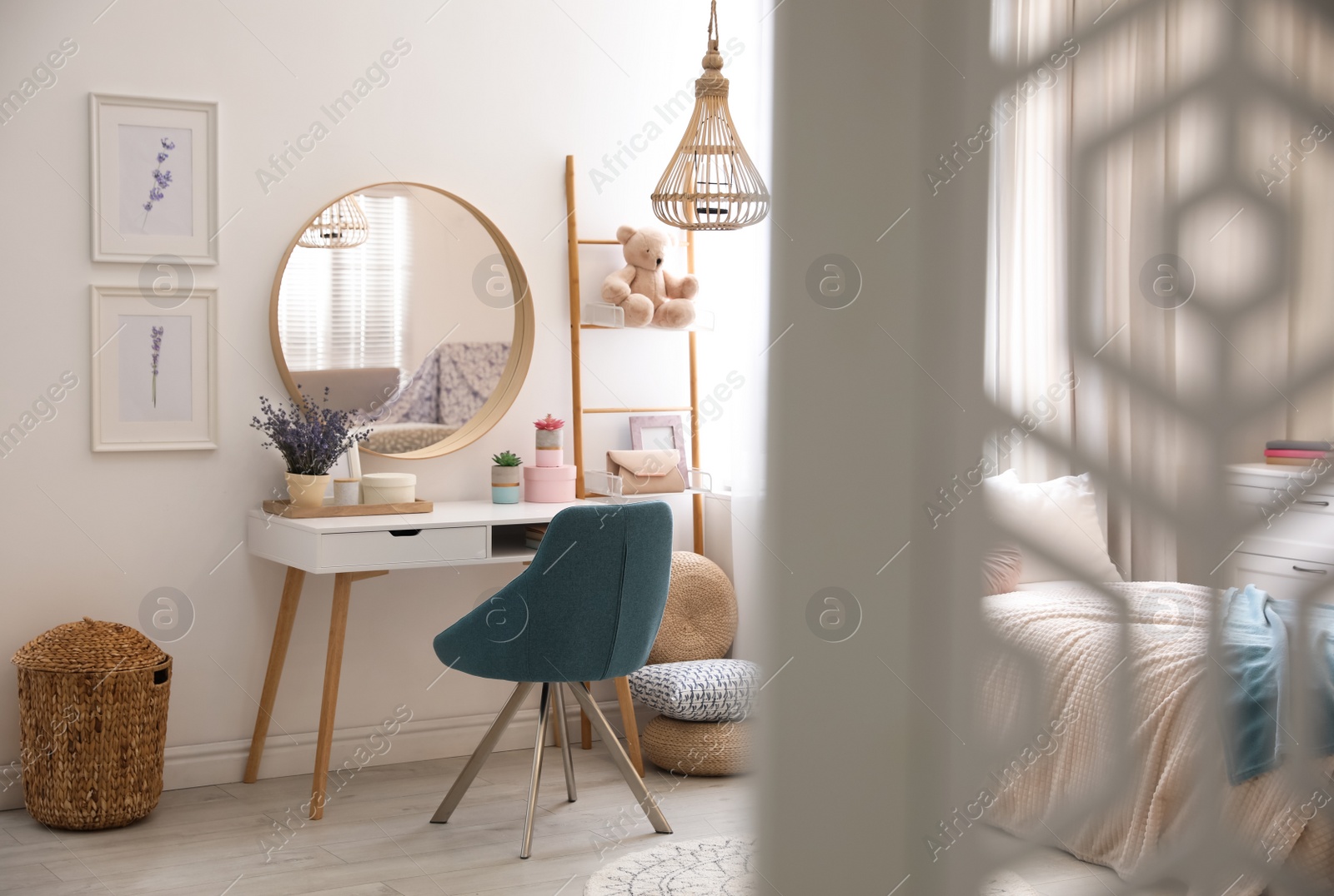 Photo of Teenage girl's bedroom interior with stylish furniture. Idea for design