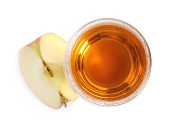 Photo of Glass with delicious cider and piece of ripe apple on white background, top view