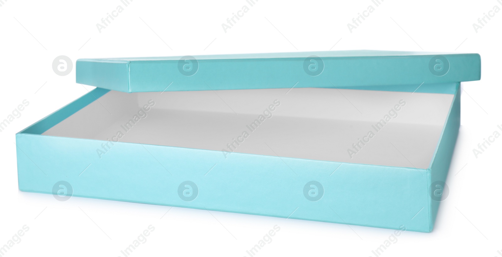 Photo of Elegant turquoise gift box isolated on white