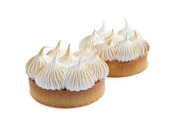 Photo of Tartlets with meringue isolated on white. Tasty dessert