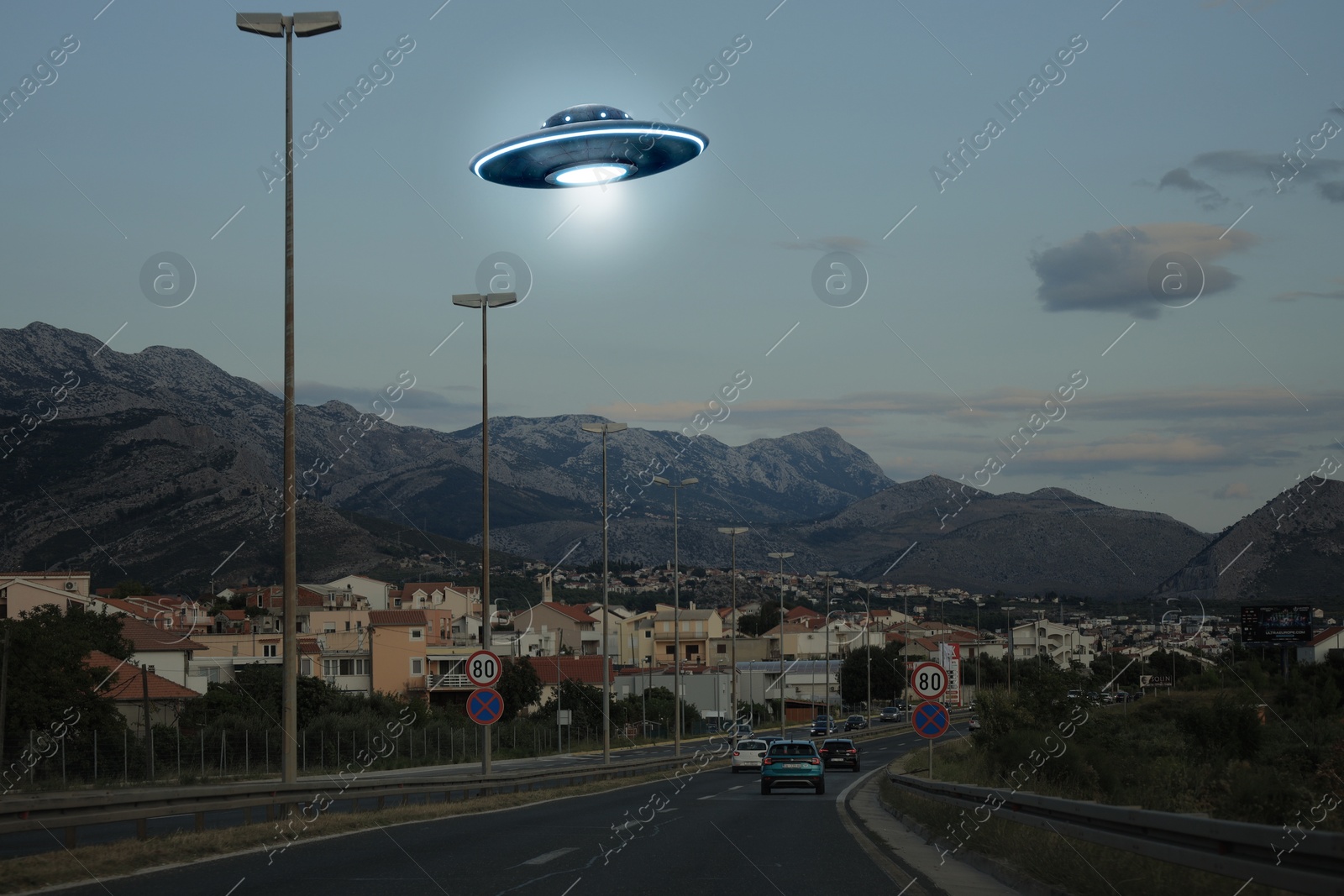 Image of Alien spaceship flying over city. UFO, extraterrestrial visitors