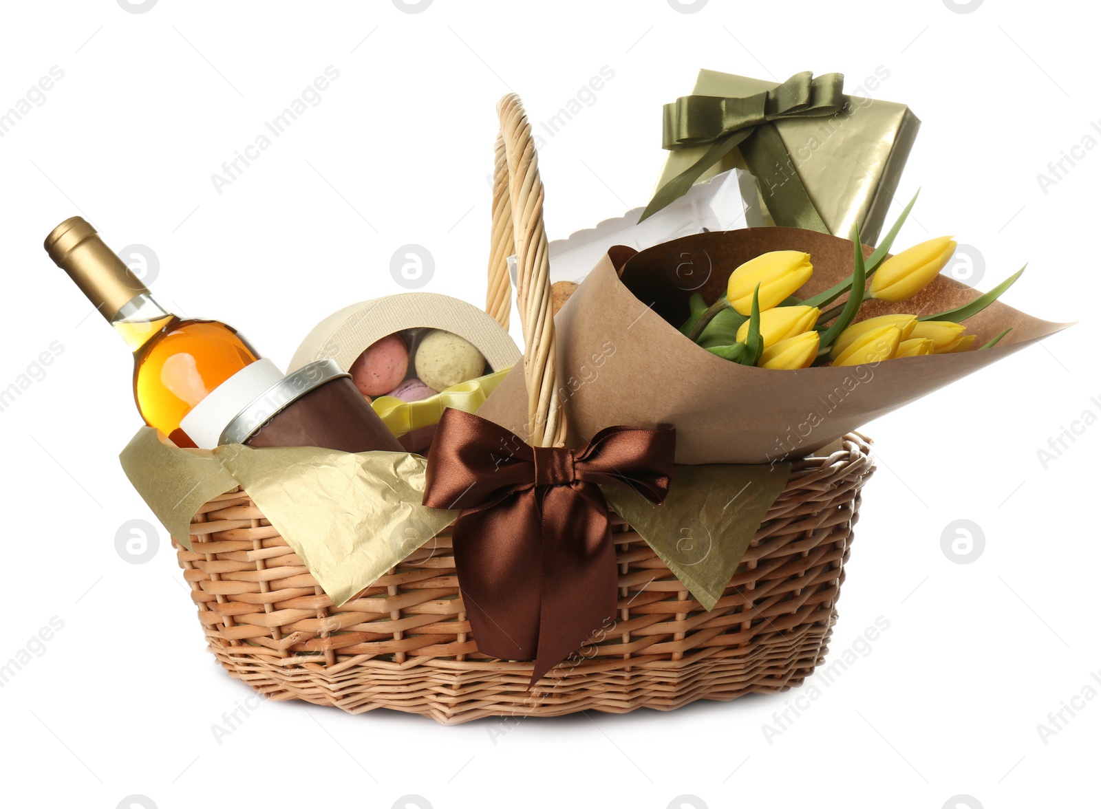 Photo of Wicker basket full of presents isolated on white