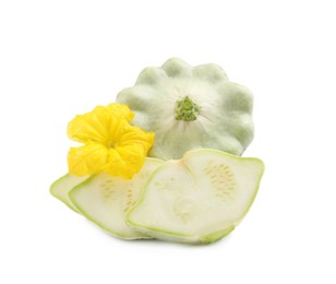 Photo of Whole and cut pattypan squashes with flower on white background