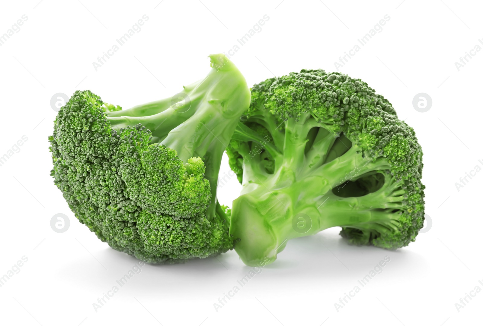 Photo of Fresh green broccoli on white background. Organic food