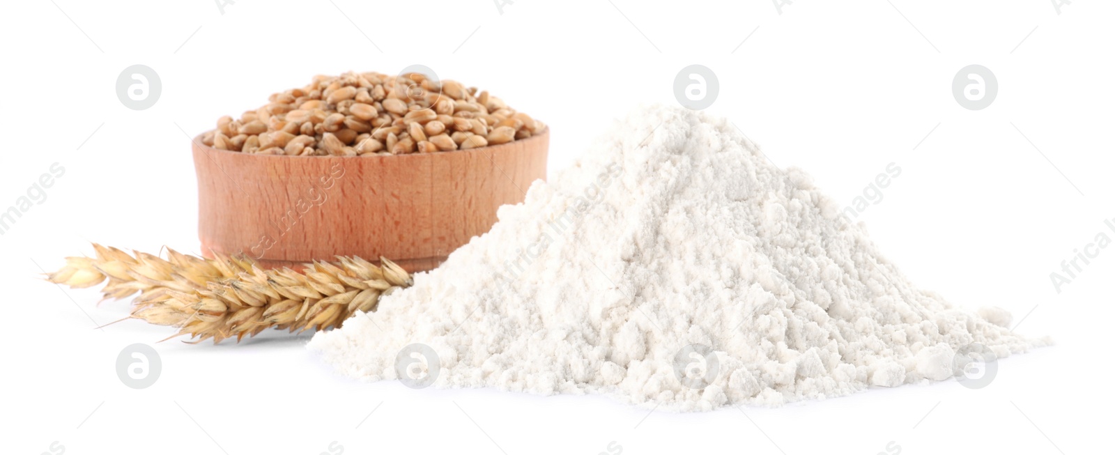 Photo of Heap of wheat flour, bowl with grains and spikelets on white background