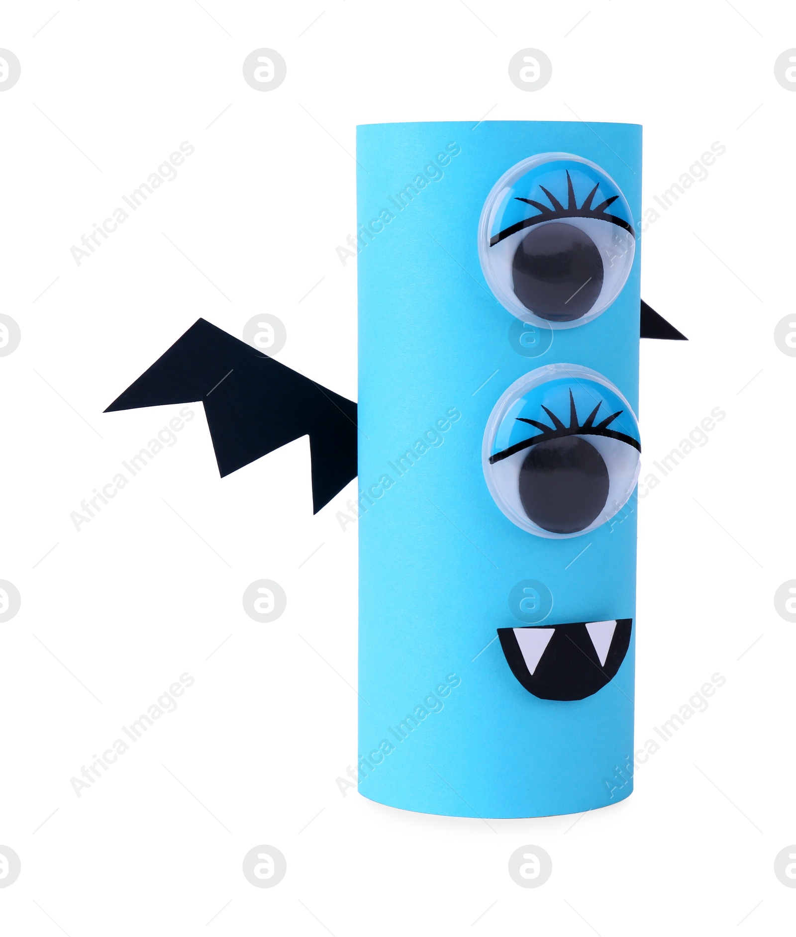 Photo of Monster made of light blue paper isolated on white. Halloween decoration
