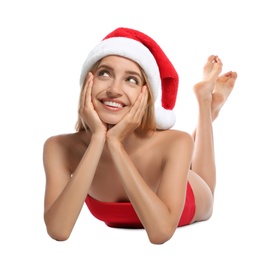 Photo of Young woman wearing Santa Claus hat on white background. Christmas vacation