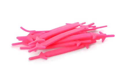 Pink silicone shoe laces on white background