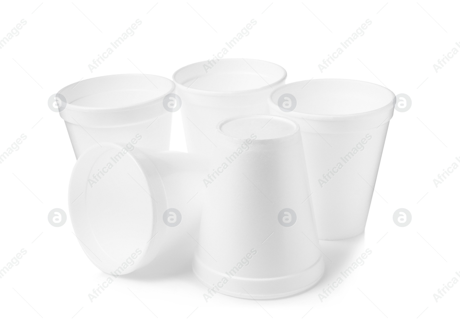 Photo of Many clean styrofoam cups on white background