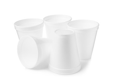 Photo of Many clean styrofoam cups on white background