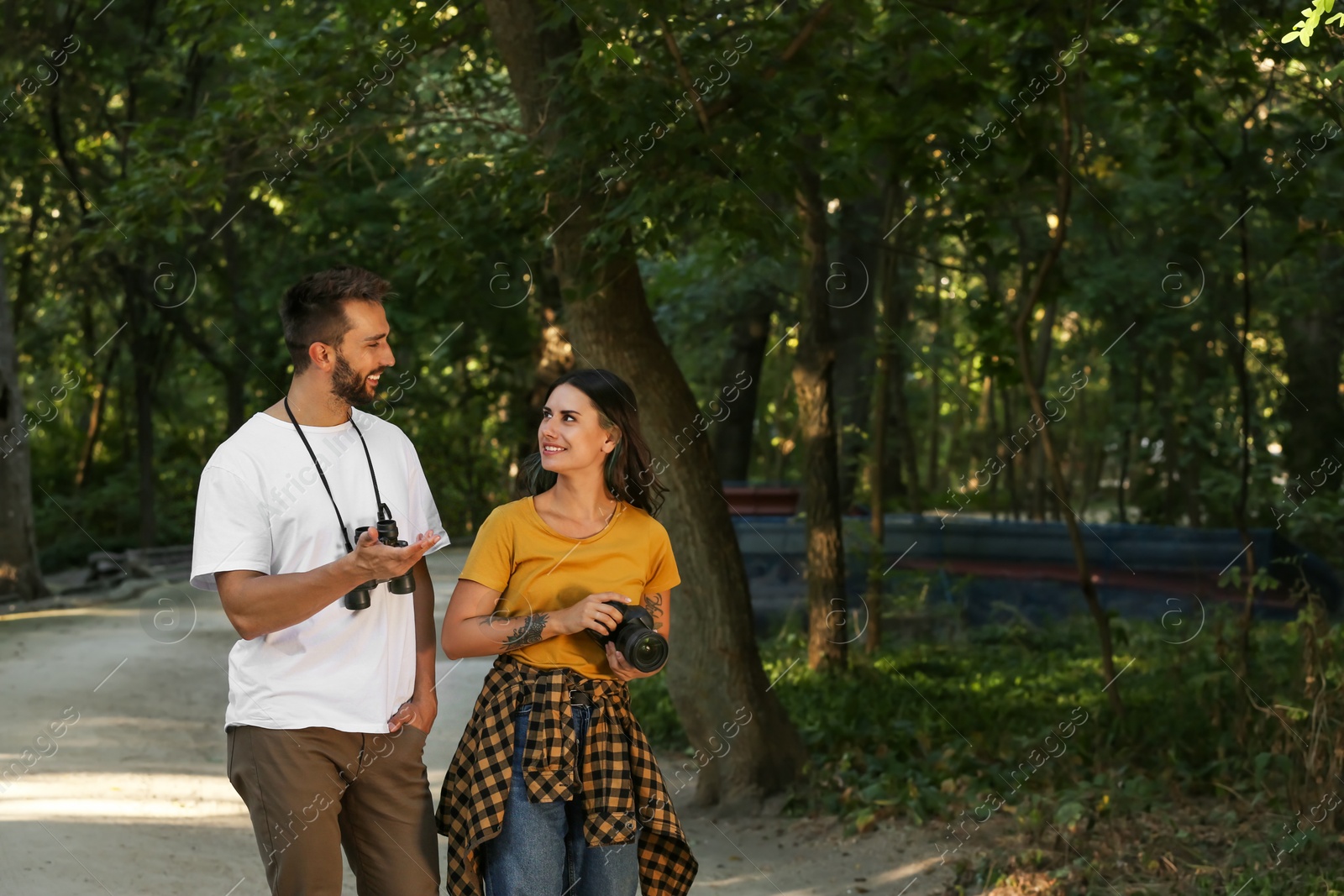 Photo of Lovely couple spending time together in nature reserve