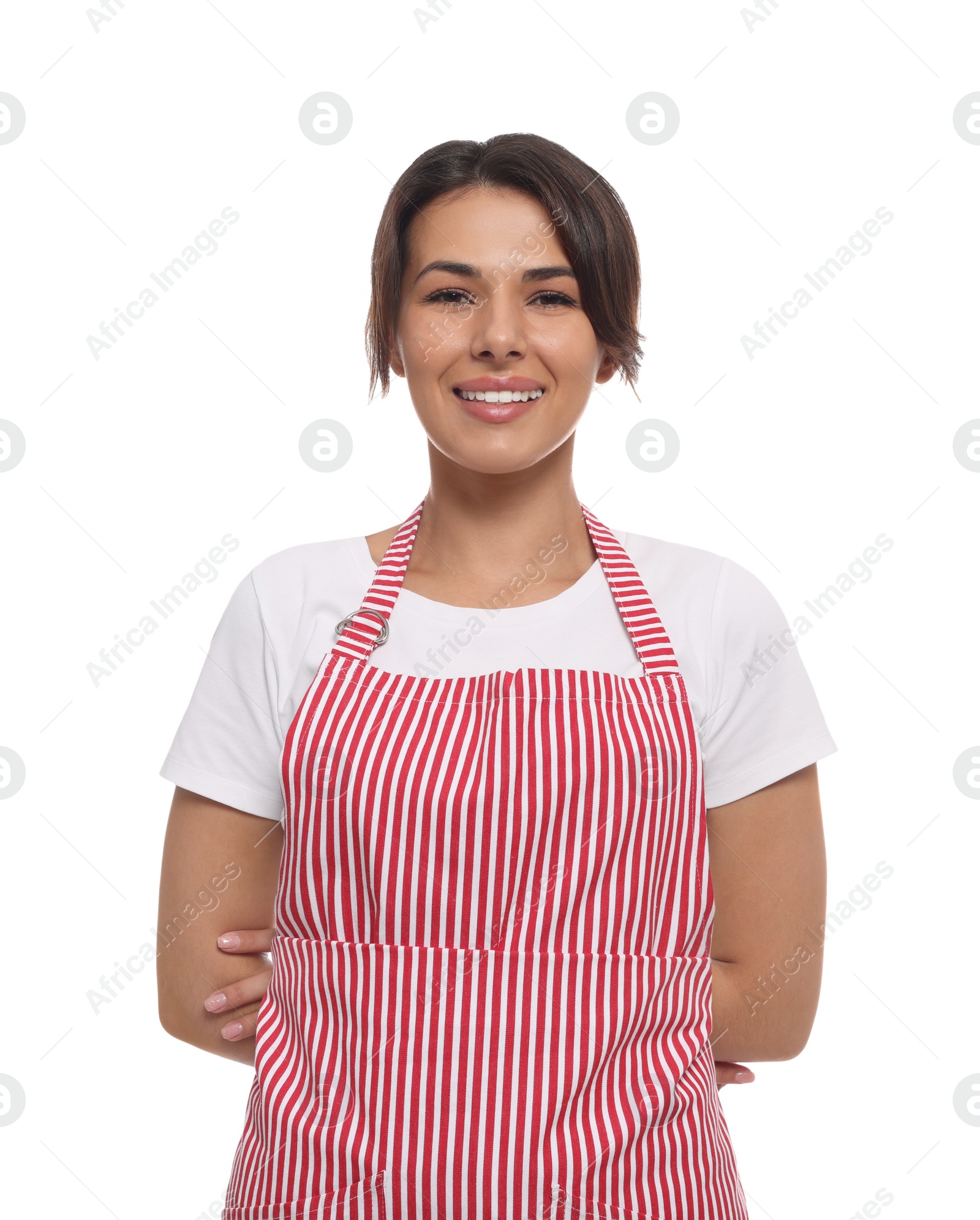 Photo of Young woman in red striped apron on white background