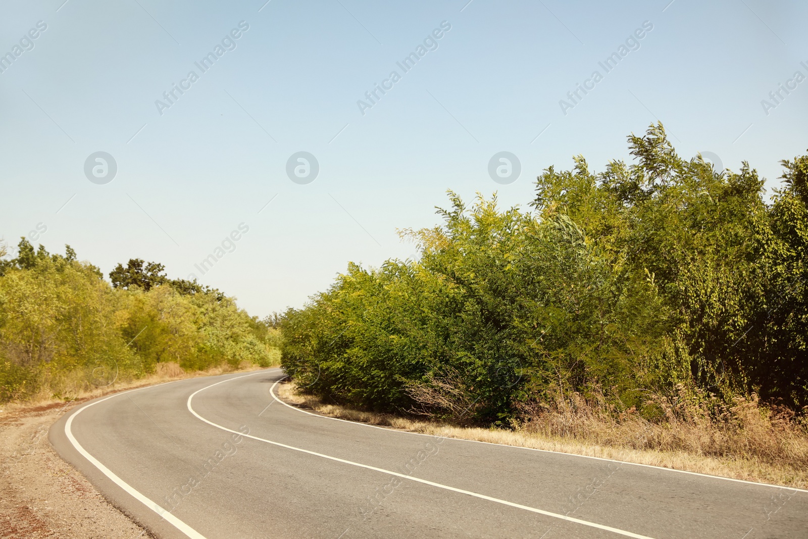 Photo of Beautiful view of empty asphalt highway. Road trip