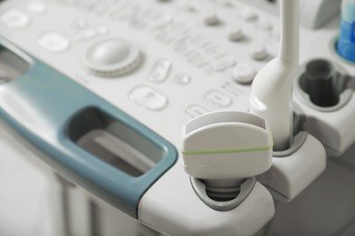 Ultrasound control panel with ultrasonic transducers indoors, closeup. Medical equipment