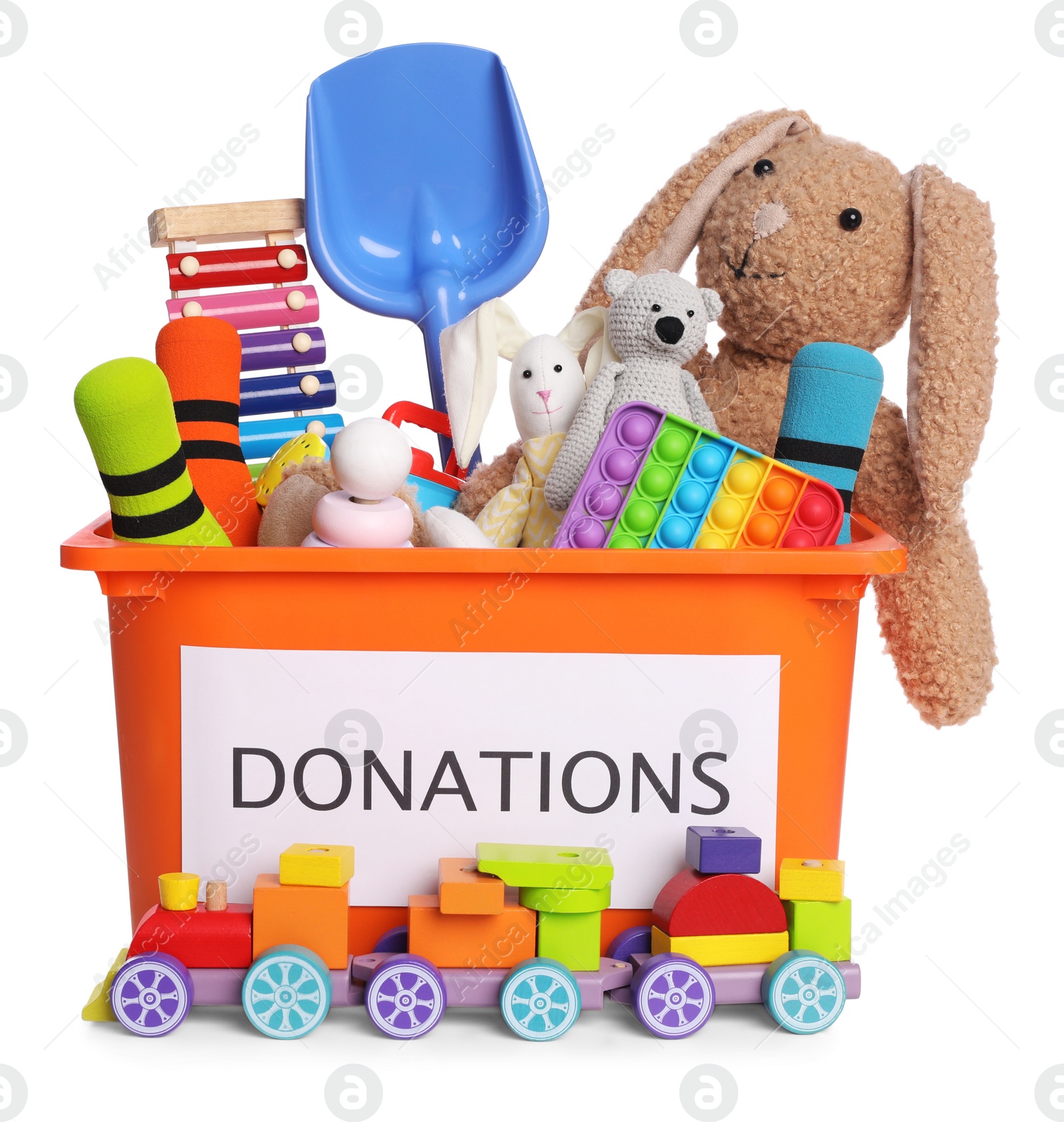 Photo of Donation box and different toys isolated on white