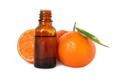 Aromatic tangerine essential oil in bottle and citrus fruits isolated on white