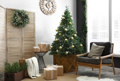 Beautiful interior with decorated Christmas tree in living room