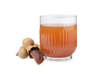 Glass of tamarind juice and fresh fruits isolated on white