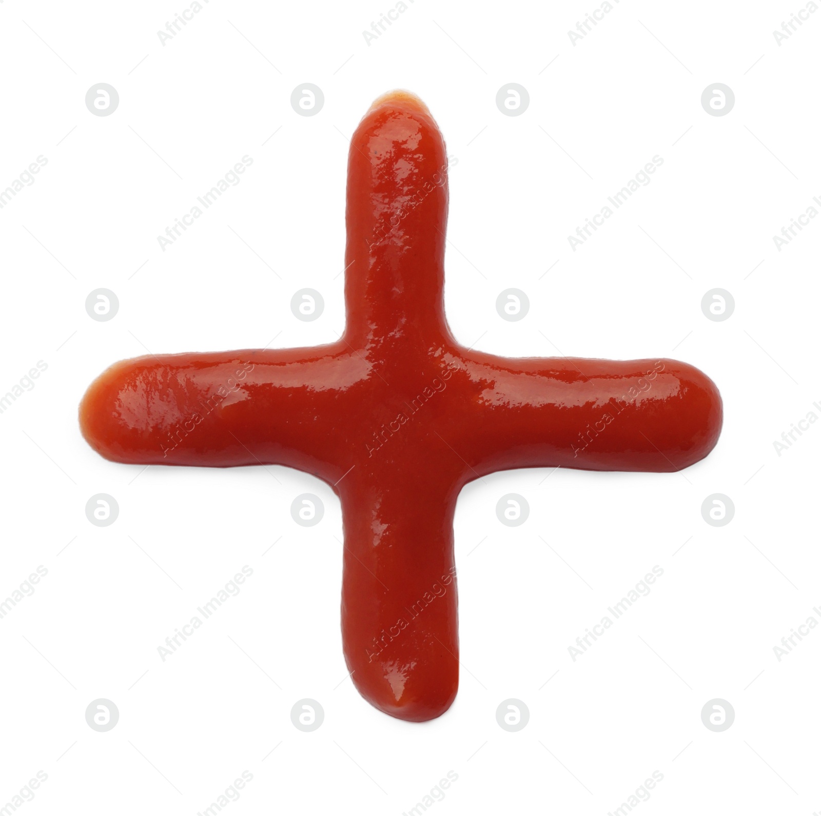 Photo of Plus symbol drawn by ketchup on white background