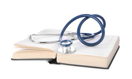 Photo of Open student textbook and stethoscope on white background. Medical education