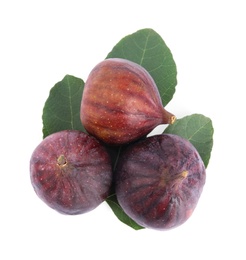 Photo of Fresh juicy purple figs and green leaves on white background, top view