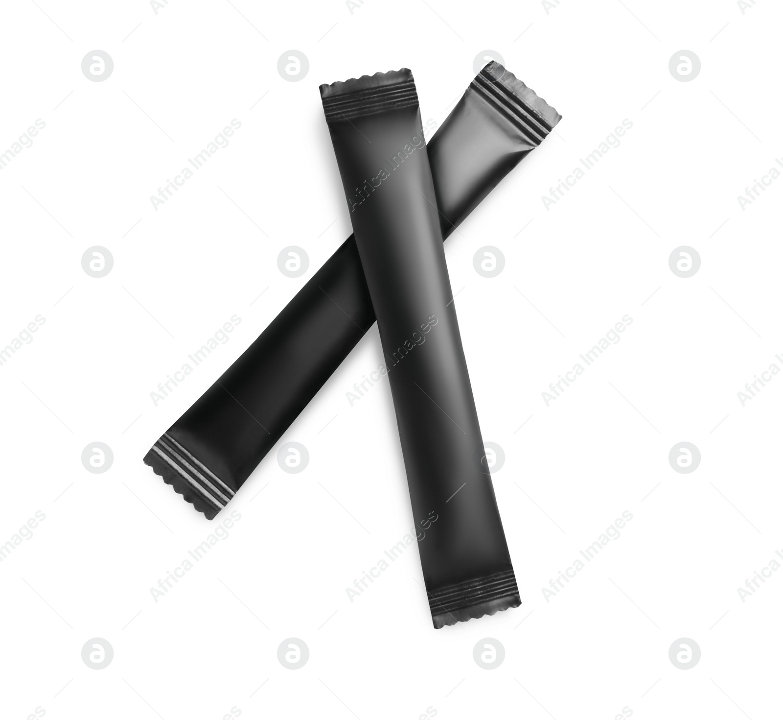 Photo of Black sticks of sugar on white background, top view