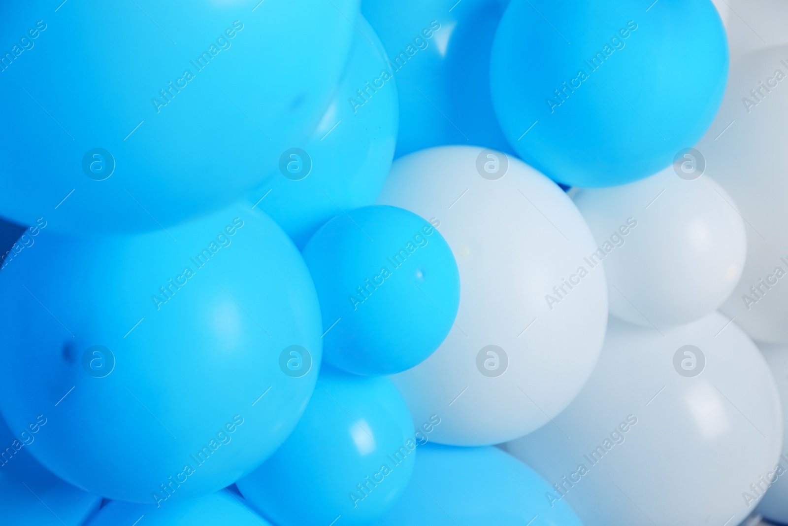 Photo of Many color balloons as background, closeup. Party decor