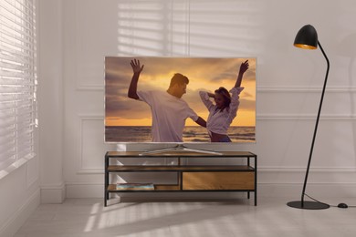 Scene of romantic movie on TV in room