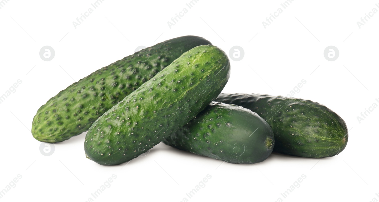 Photo of Whole fresh green cucumbers on white background