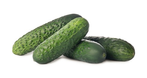 Photo of Whole fresh green cucumbers on white background