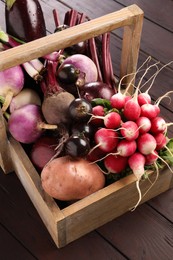 Different fresh ripe vegetables on wooden table