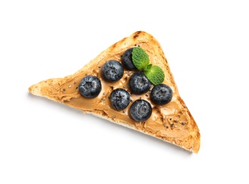 Photo of Tasty toast with blueberries, mint, peanut butter and chia seeds on white background, top view