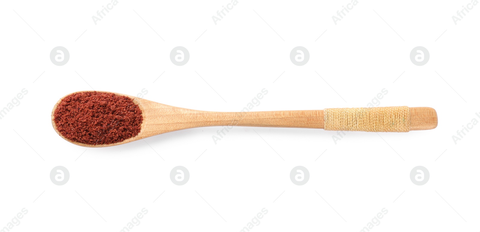 Photo of Dried cranberry powder in wooden spoon isolated on white, top view