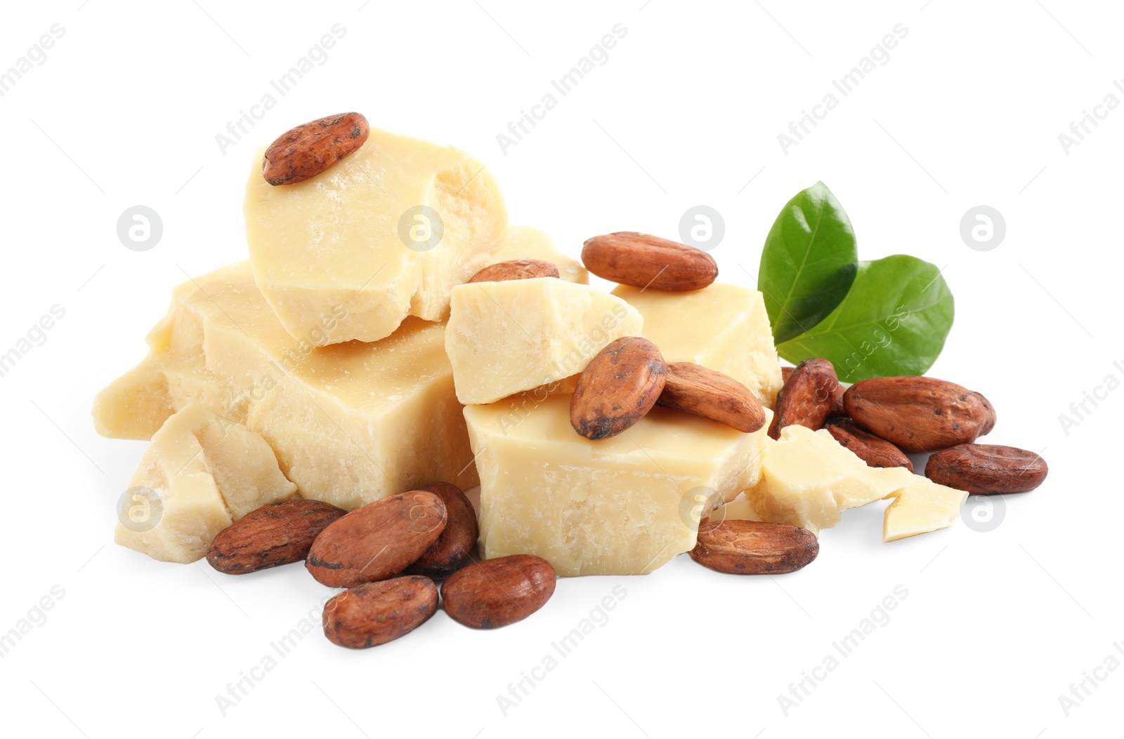 Photo of Organic cocoa butter, beans and green leaves isolated on white