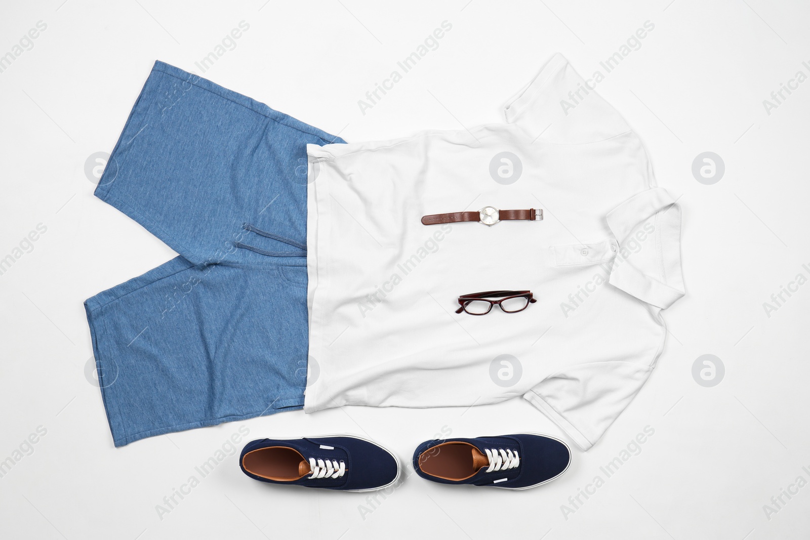 Photo of Set of stylish clothes and accessories on white background, flat lay