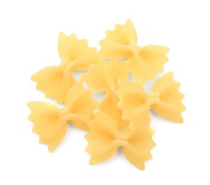 Photo of Raw farfalle pasta isolated on white, top view