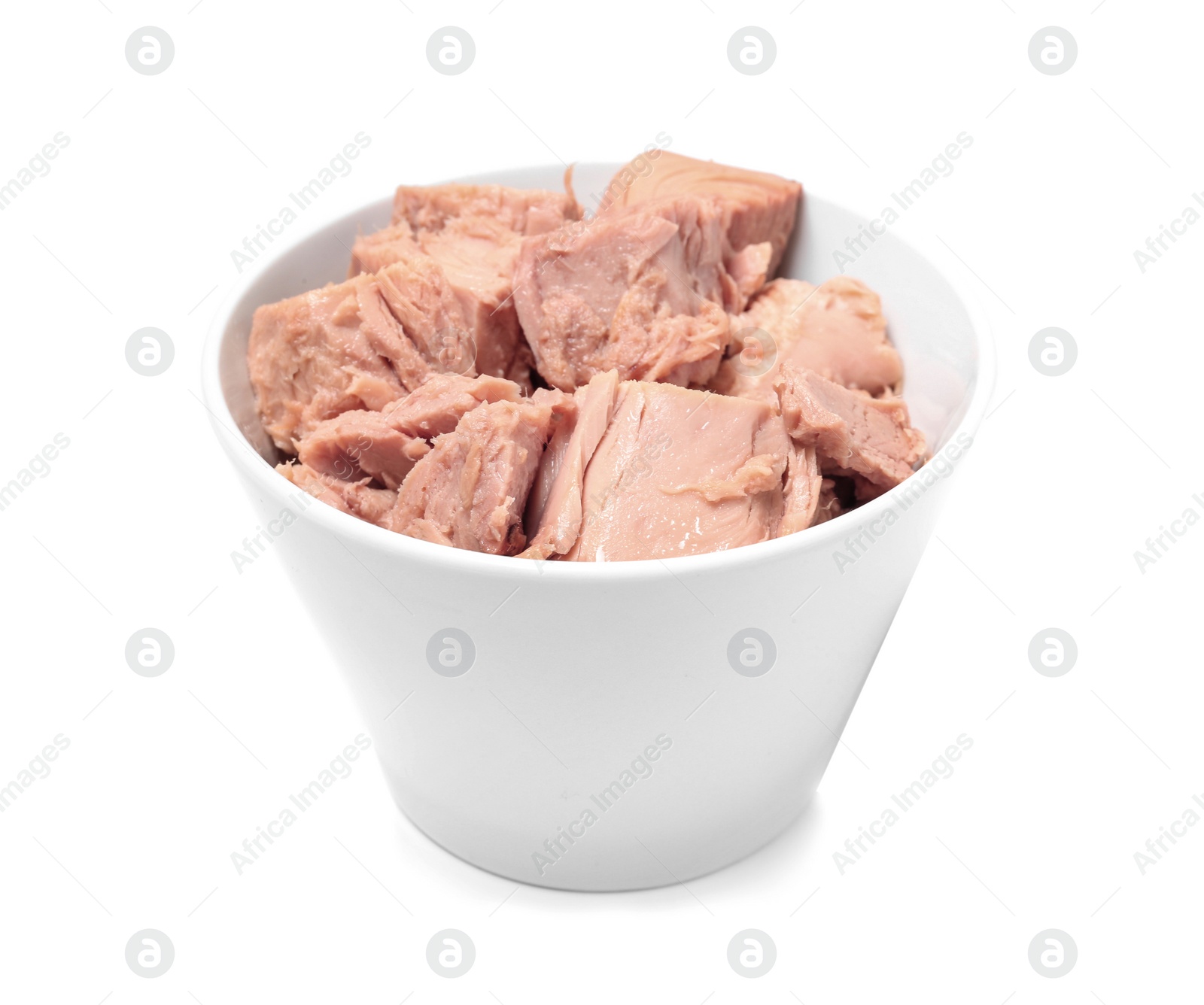 Photo of Bowl with pieces of canned tuna on white background