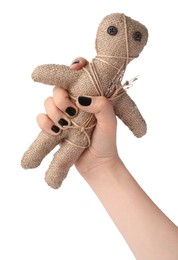 Photo of Woman holding voodoo doll with pins on white background, closeup