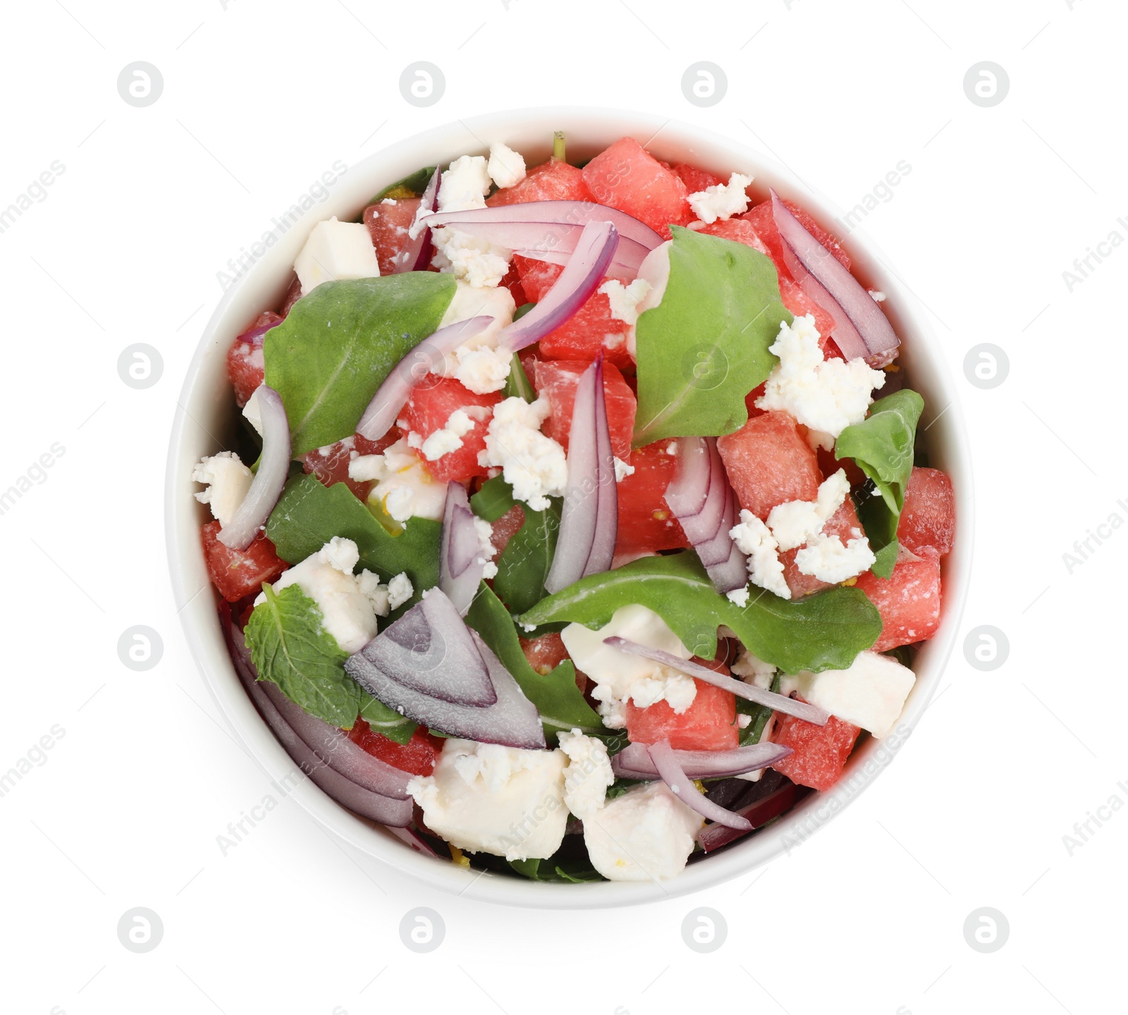 Photo of Delicious salad with watermelon, red onion, arugula and feta cheese isolated on white, top view