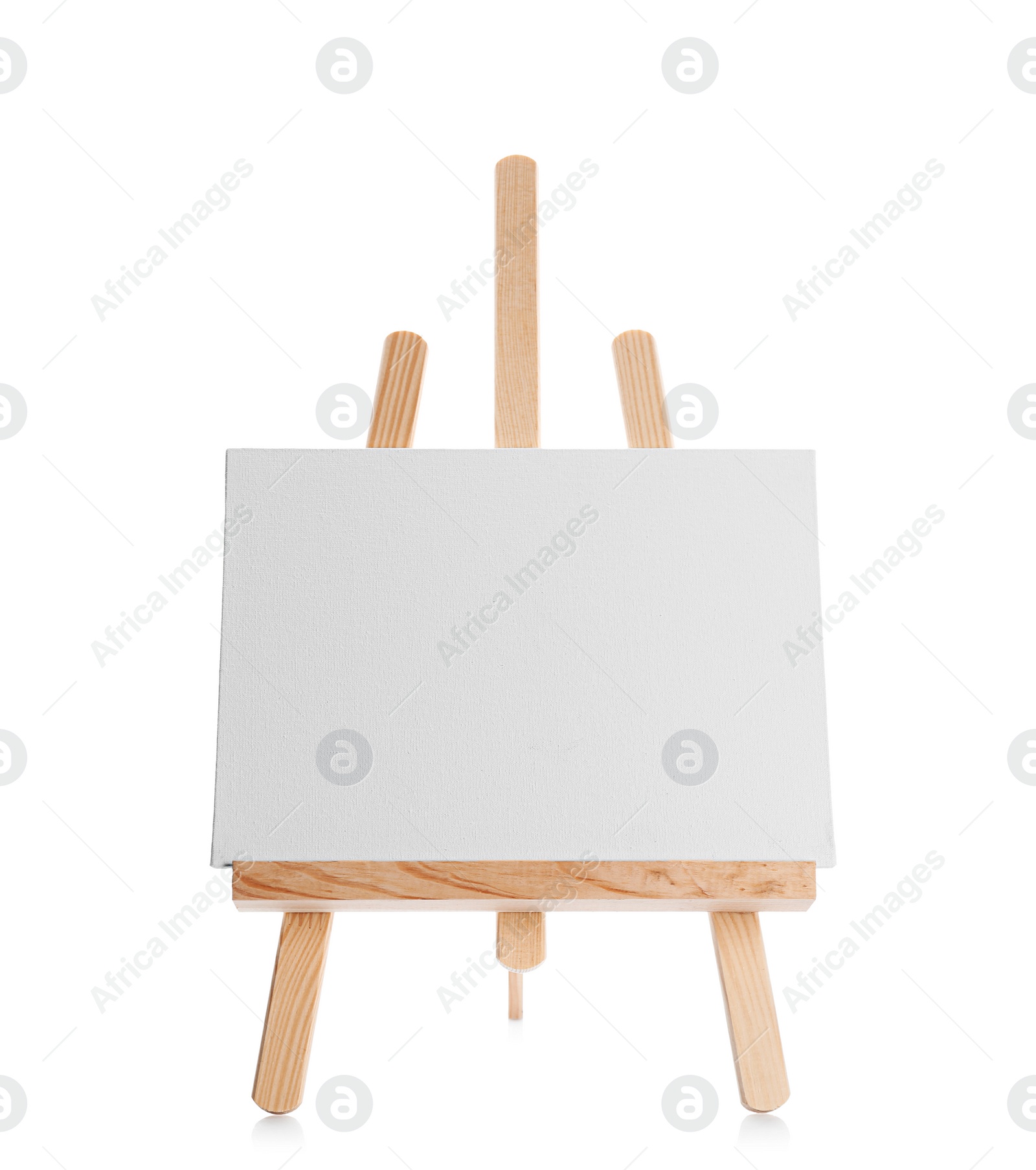 Photo of Wooden easel with blank sheet of paper on white background