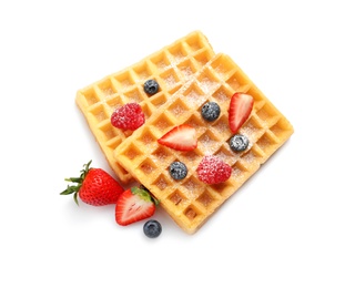 Photo of Yummy waffles with berries on white background, top view