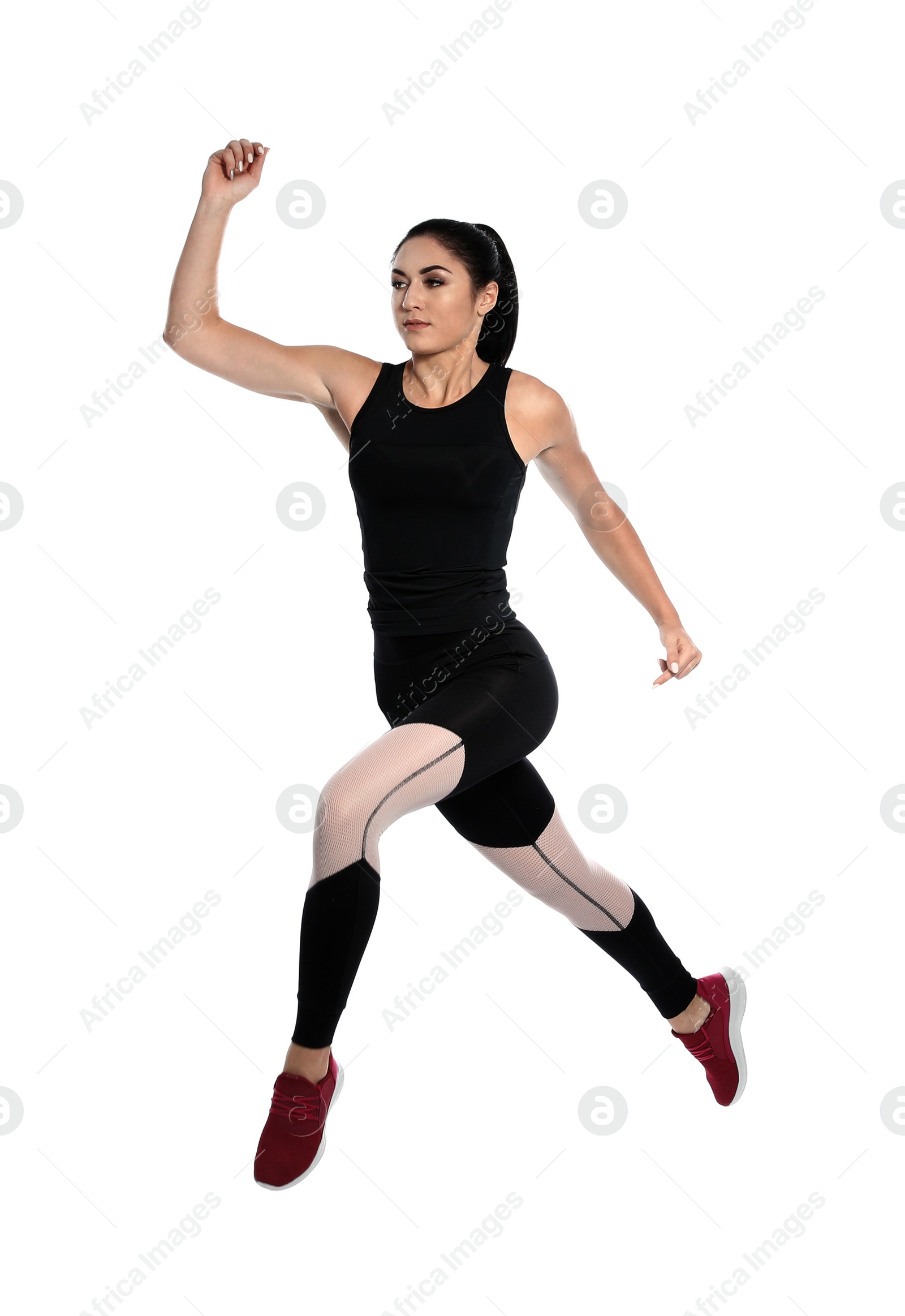 Photo of Sporty young woman running on white background