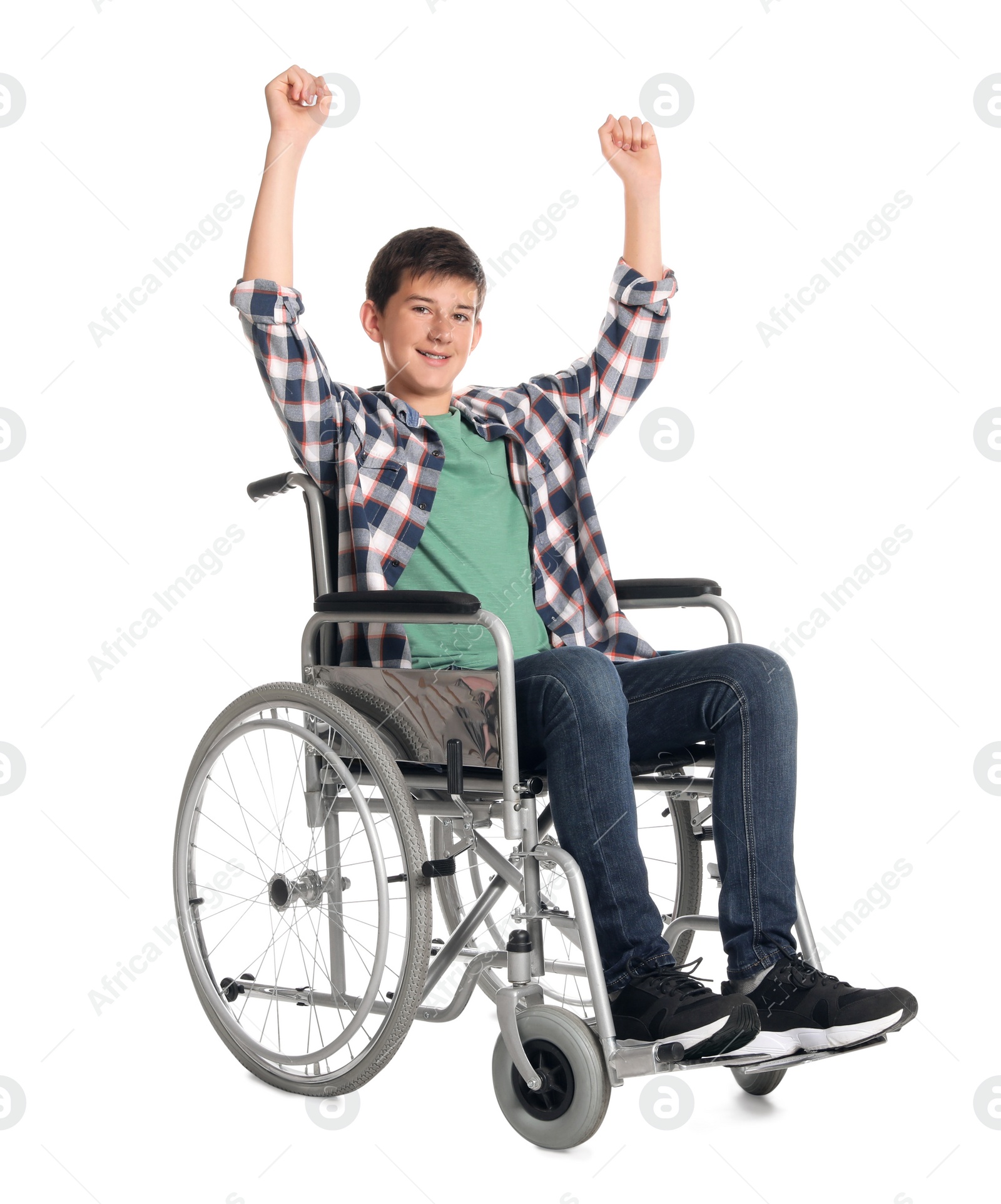 Photo of Teenage boy in wheelchair on white background