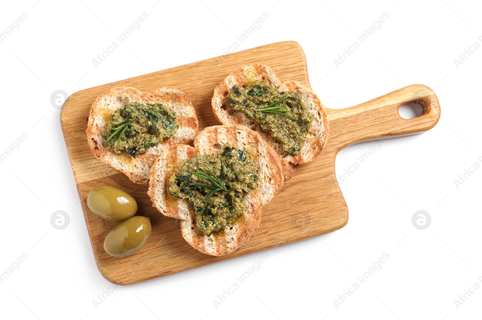 Photo of Tasty bruschettas with pesto, rosemary and olives on white background, top view