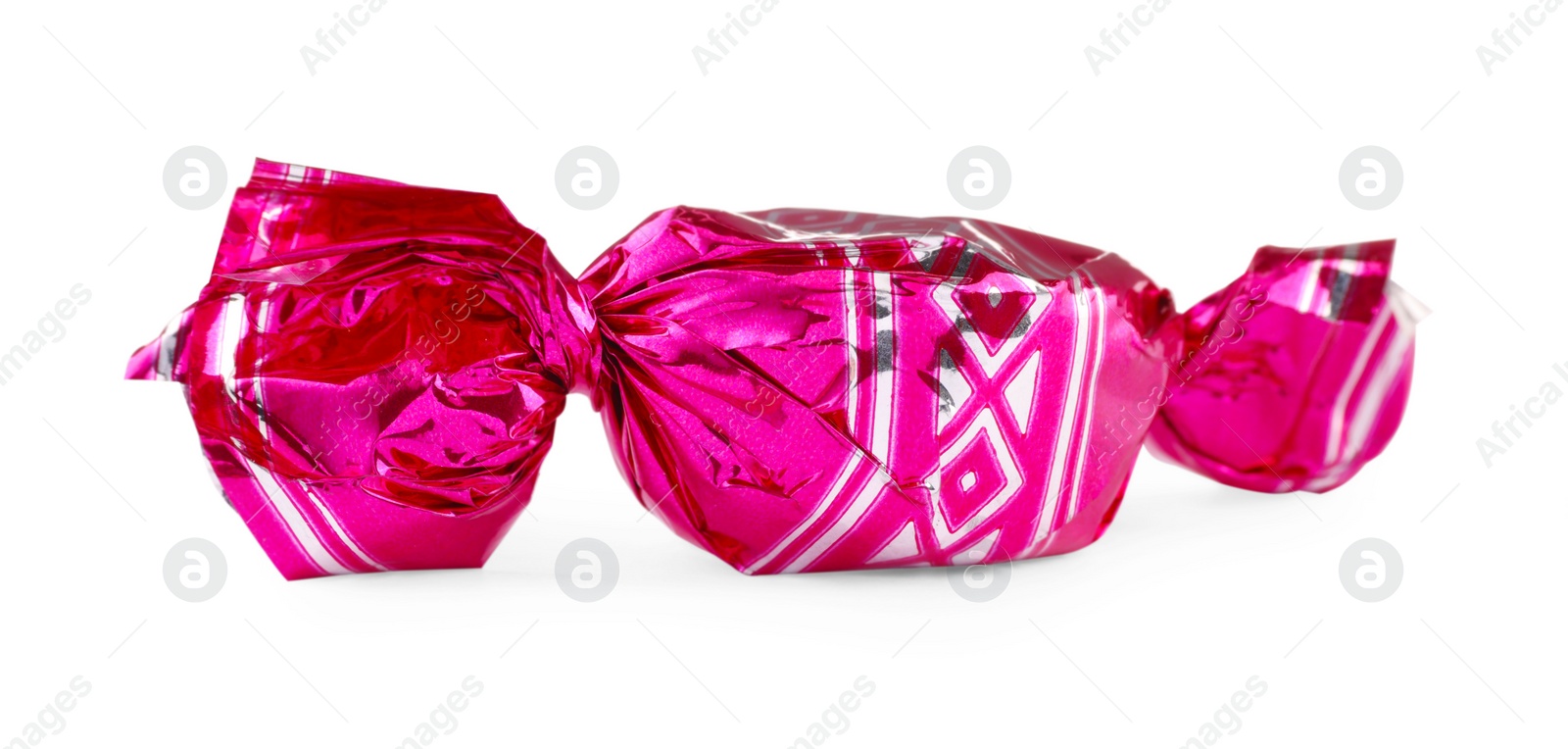 Photo of Candy in bright pink wrapper isolated on white