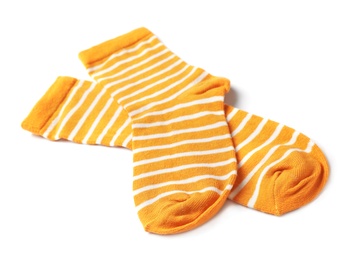 Photo of Pair of cute child socks on white background