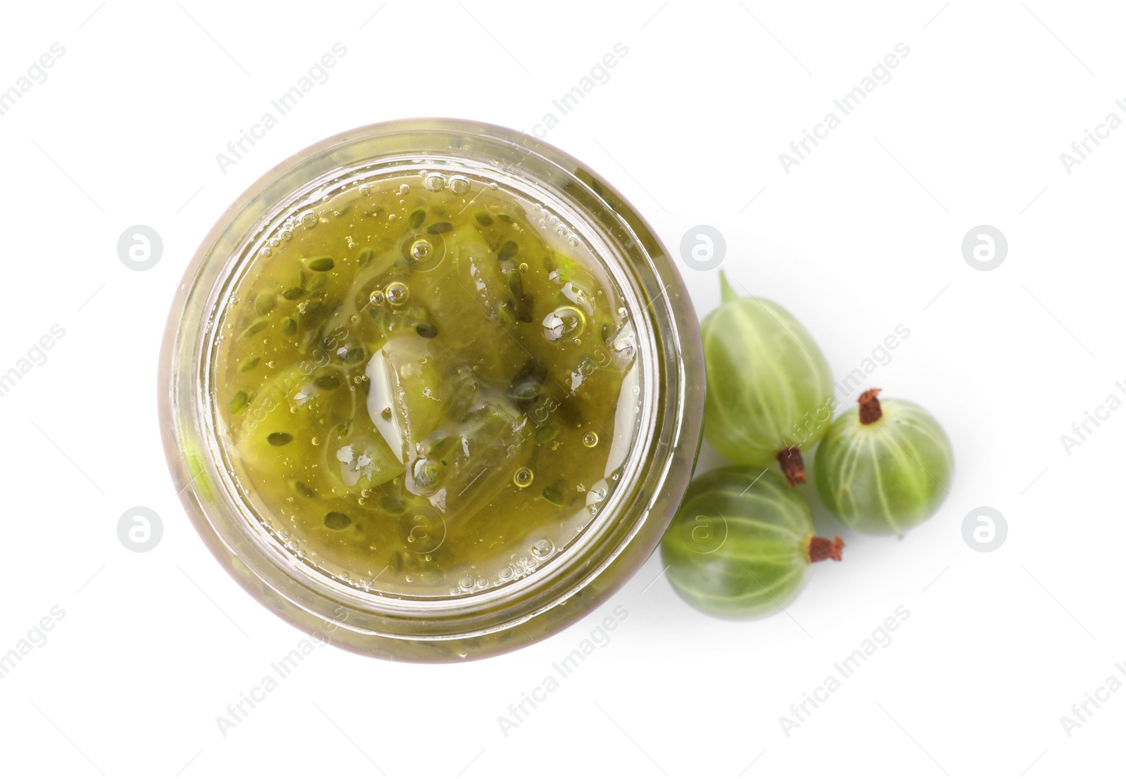 Photo of Jar of delicious gooseberry jam and fresh berries on white background, top view