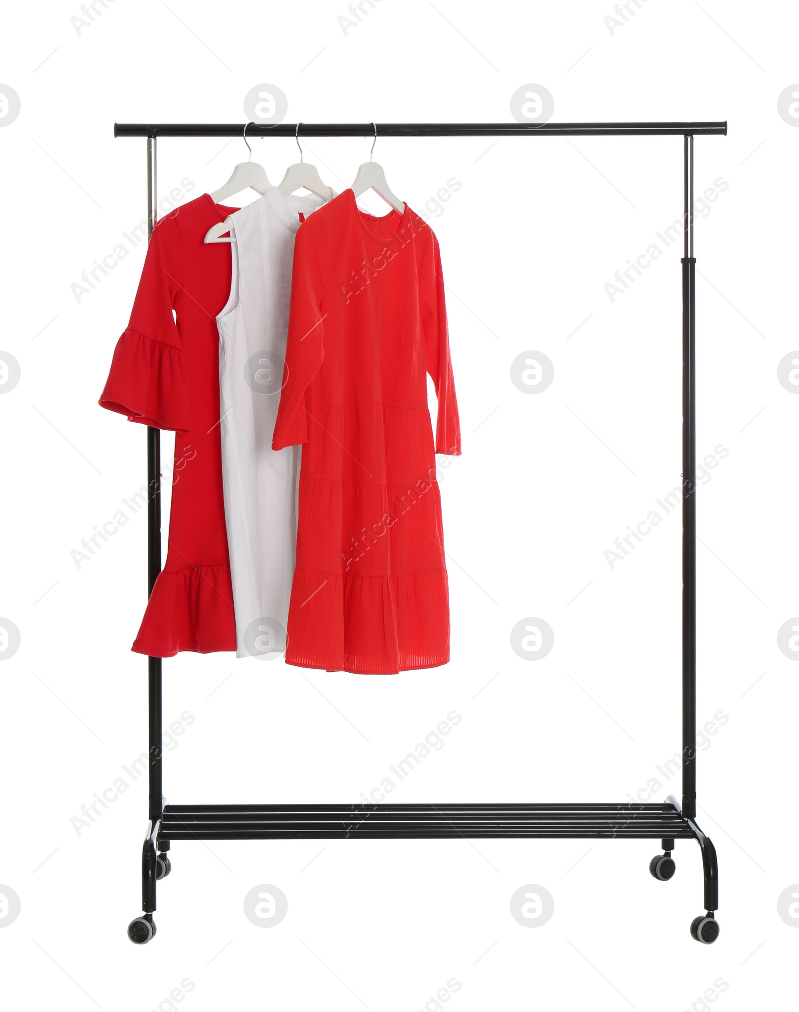 Photo of Rack with stylish women's clothes isolated on white