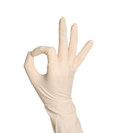 Doctor in medical glove showing OK gesture on white background