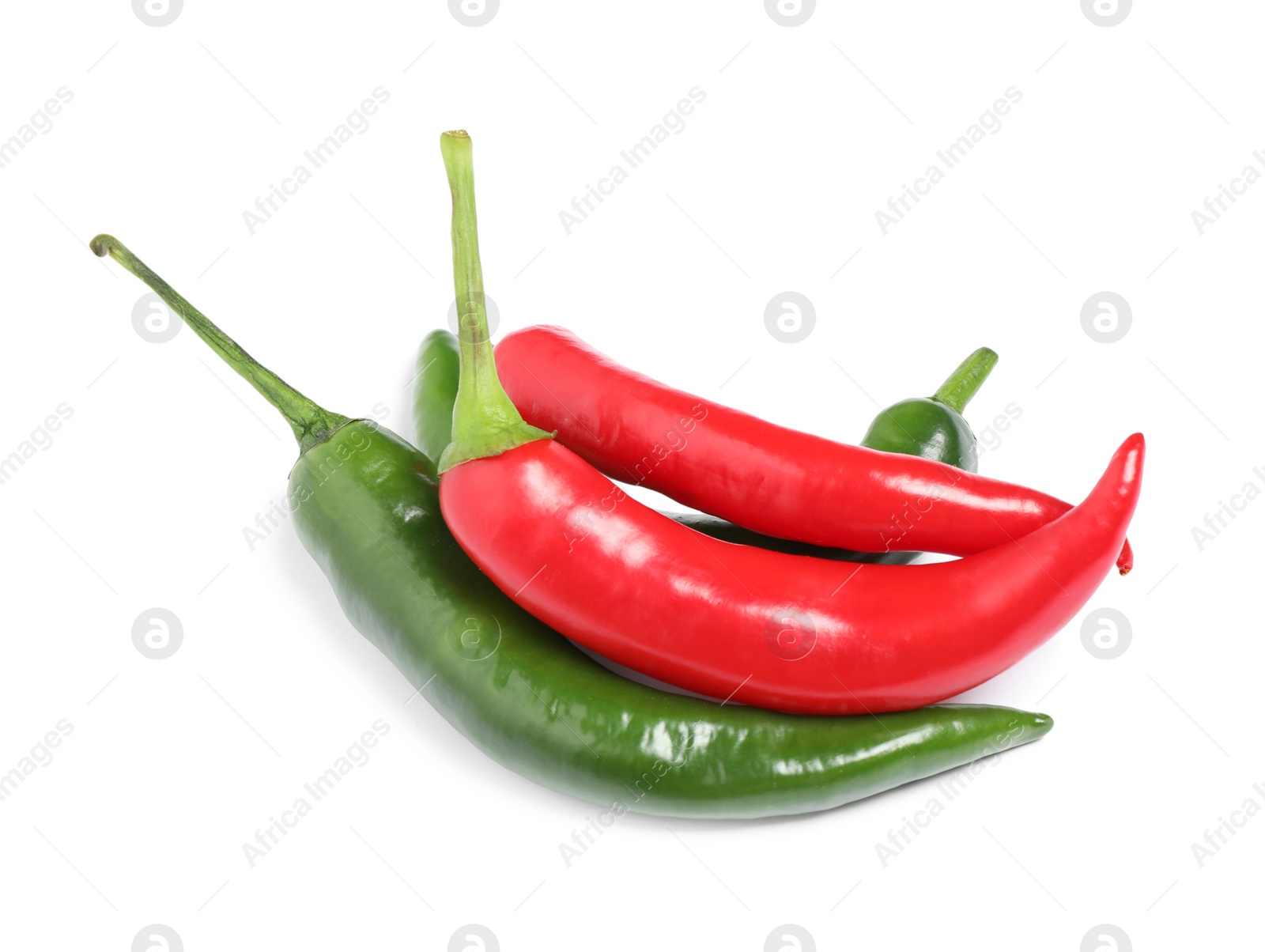 Photo of Ripe hot chili peppers on white background